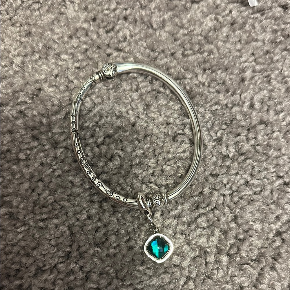 Elegant Silver Bracelet with Green Charm